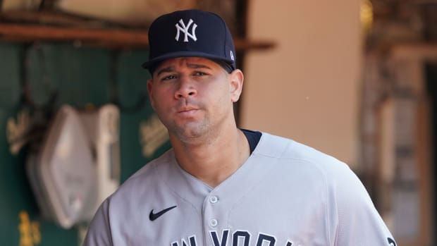 Yankees C Gary Sanchez walking in dugout